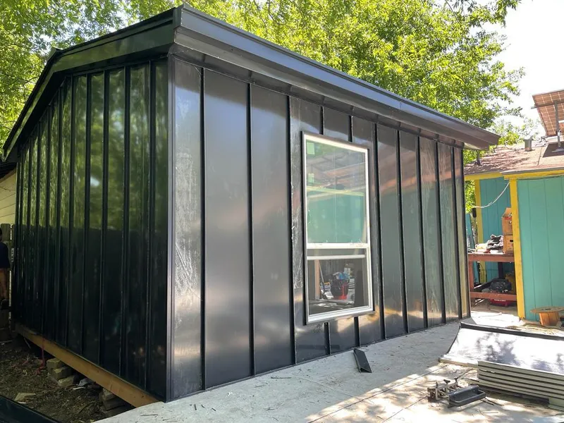 Black standing seam metal wall panels for Roof Inspection in Tell City